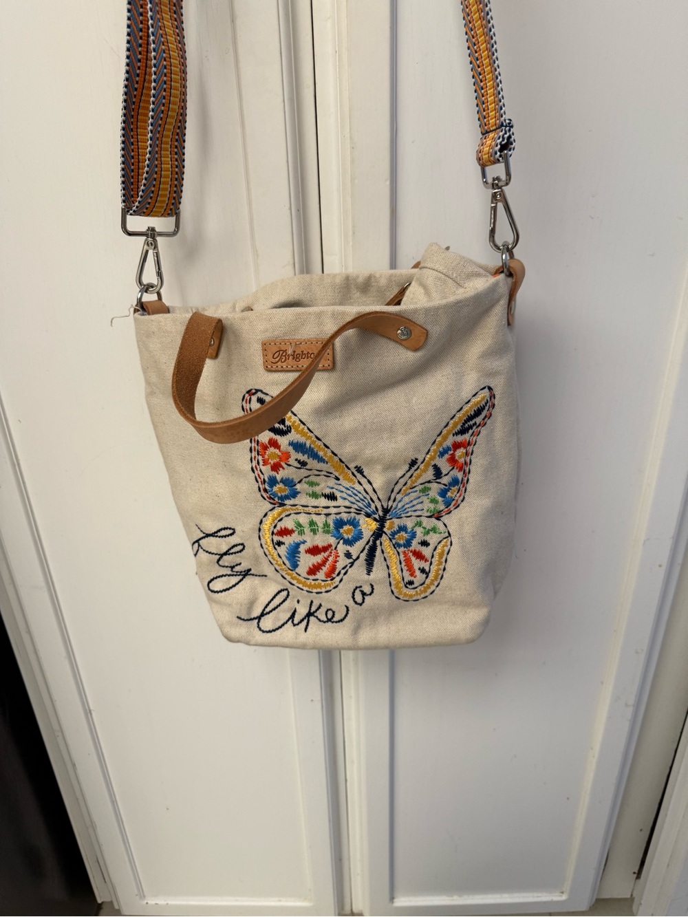 Brighton Cream Canvas Crossbody Bag with Multicolor Embroidered Butterfly